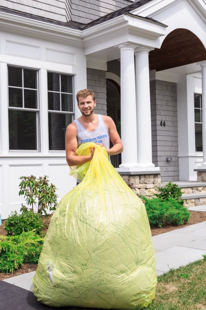 Poseidon Moving Boston movers handling client’s belongings with care in Boston.