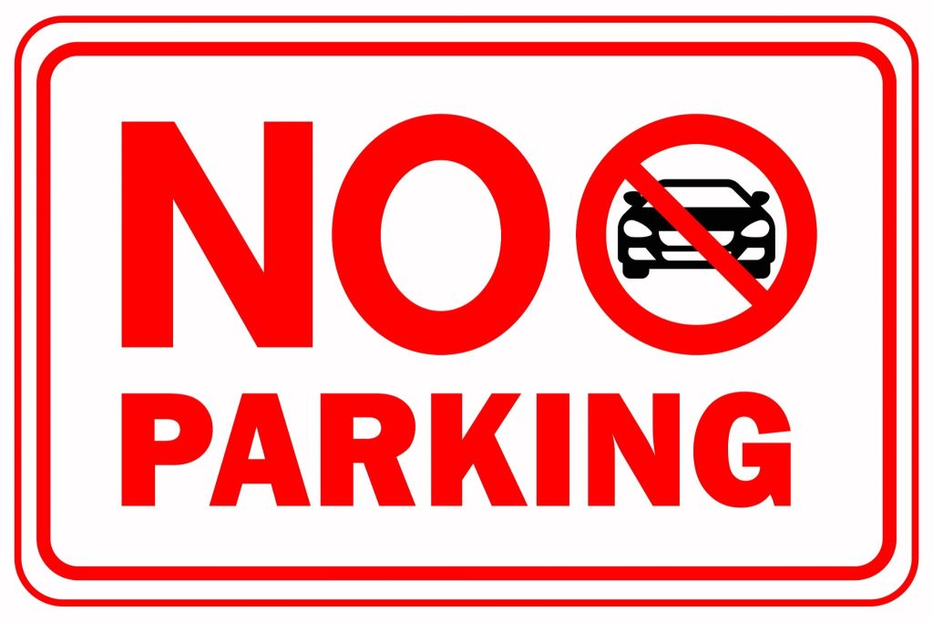 No Parking sign with a red border and car icon inside a prohibition symbol.