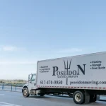 Poseidon Moving box truck on the road during a professional relocation