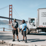 Poseidon Moving truck with movers on-site and ready to work