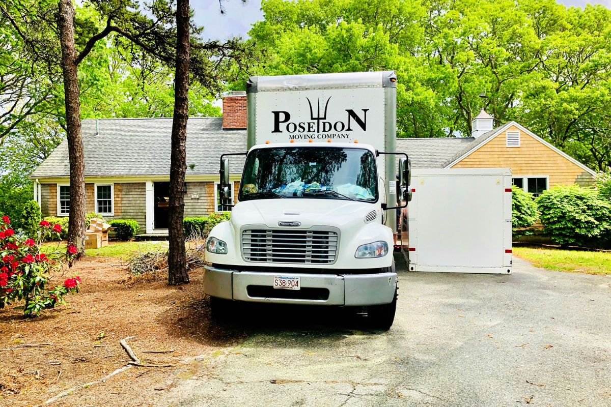 Poseidon Moving residential movers carrying furniture
